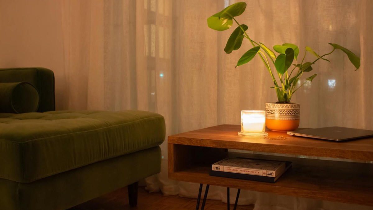stylish air purifier with soft mood lighting in a cozy living room corner