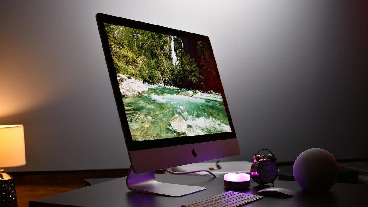close-up of a modern, compact air purifier on a desk in a minimalist room