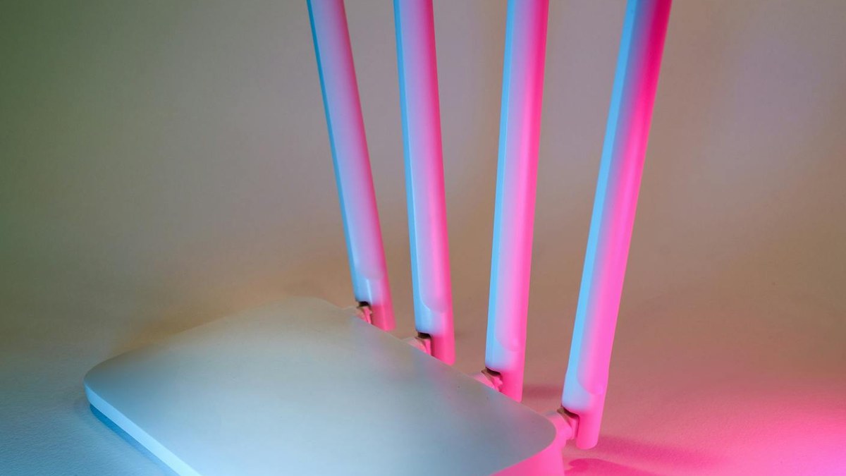 modern home office with multiple devices connected to a router