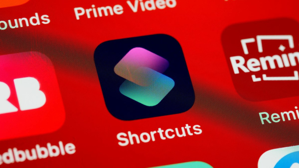 split screen showing a mobile app interface and underlying code structure