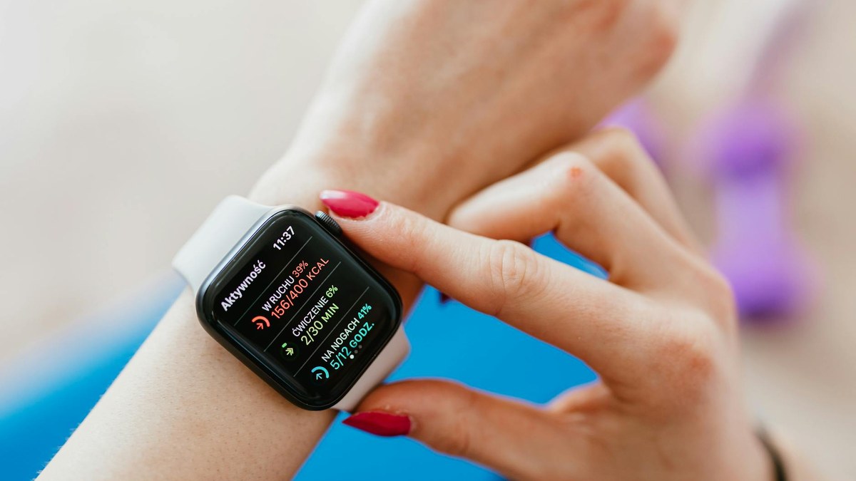 close-up of a smartwatch displaying heart rate and activity zones