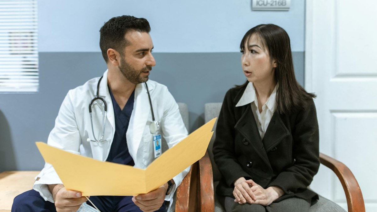 doctor consulting with a patient about sleep