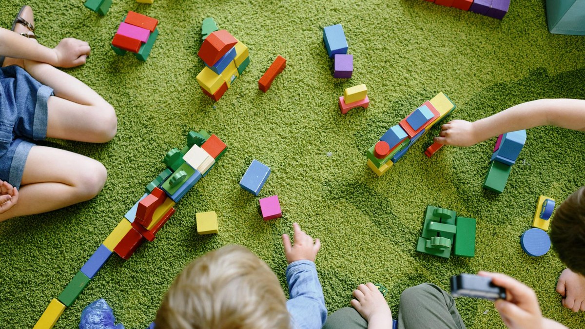 children playing with building blocks