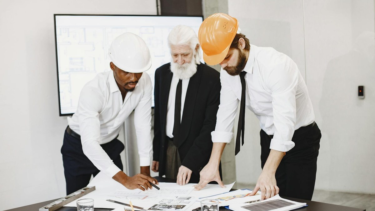 diverse small business team reviewing emergency response plan