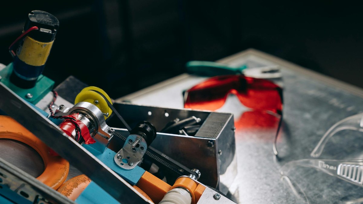 engineer using AR glasses to overlay instructions on a complex machine