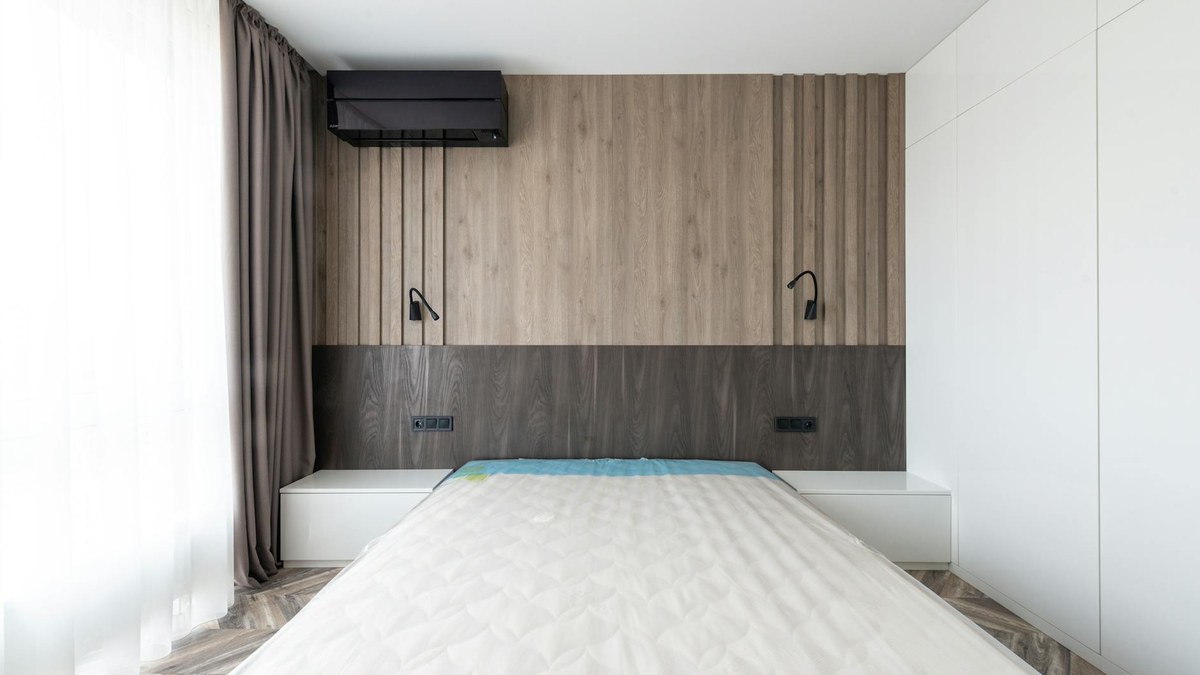 bright and airy small bedroom with light colors and minimal decor