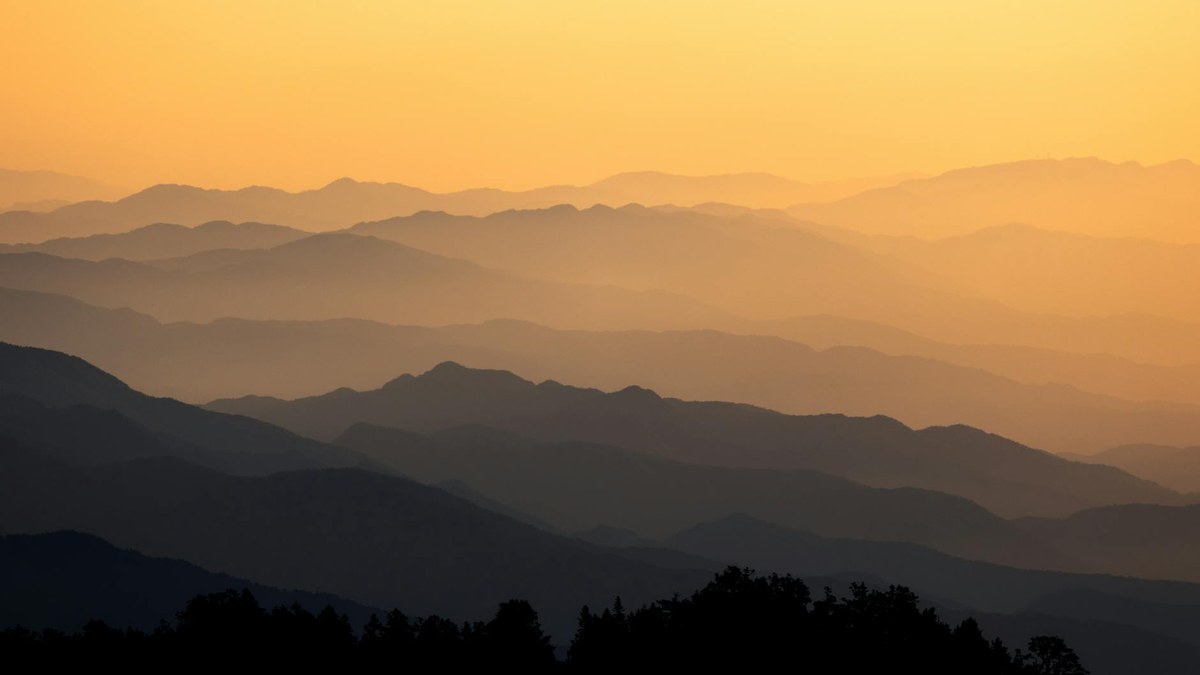 serene korean mountain landscape with mist in early morning
