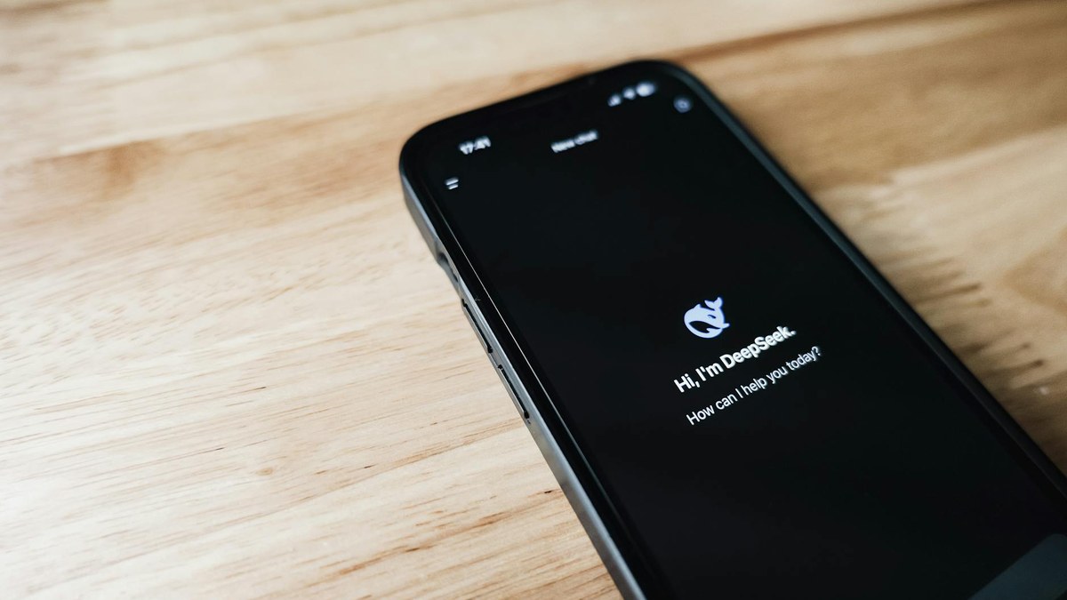 sleek, futuristic personal AI assistant device on a desk