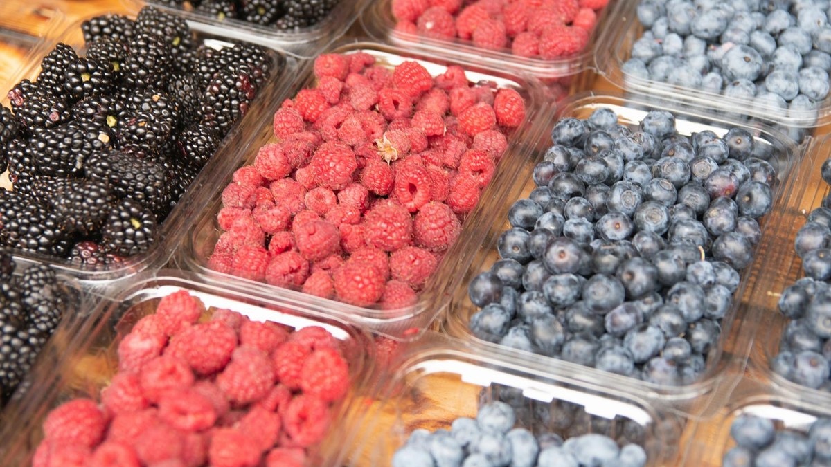 selection of fresh fruits and vegetables rich in antioxidants, like berries, citrus, leafy greens